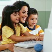 Mother and Children  Using Computer